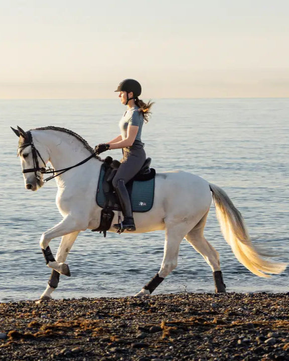LEMIEUX EARTH Ocean Dressage Saddle Pad from Equiflair: Horseback riding on the beach. Sustainable equestrian gear. 
