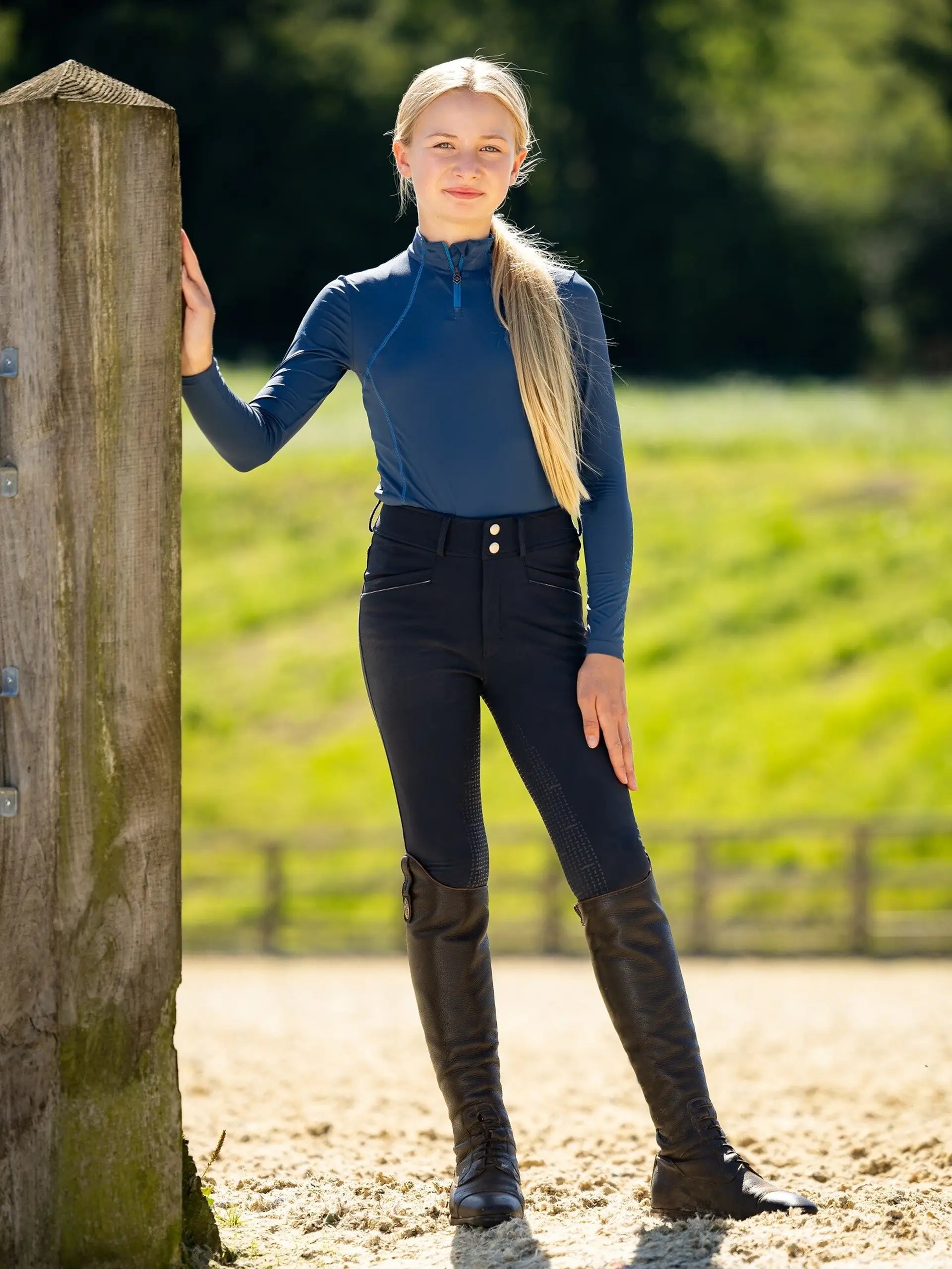 LeMieux Young Rider Freya Pro Breeches in Navy - Equestrian Apparel by Equiflair. Girl in riding attire. Full Seat Breeches.