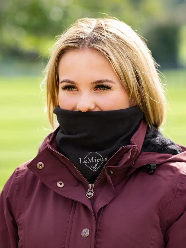 LeMieux Black Stretch Snood: Woman Wearing Warm Neck & Face Cover for Winter