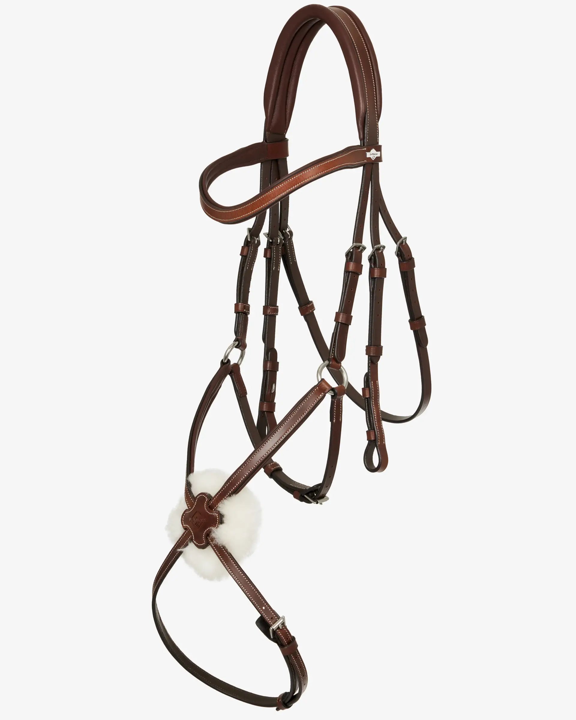 LEMIEUX Arika Grackle Bridle Havana/Silver: Brown leather horse bridle with silver fittings and white nose pad. Equestrian equipment.