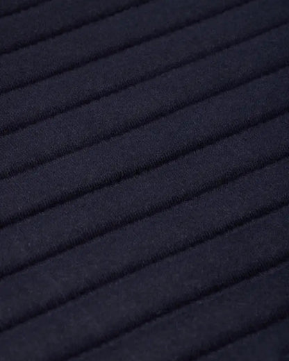 LeMieux Memory Foam Bandage Pads - Navy: Close-up of quilted horse leg protection with memory foam support and soft towelling.