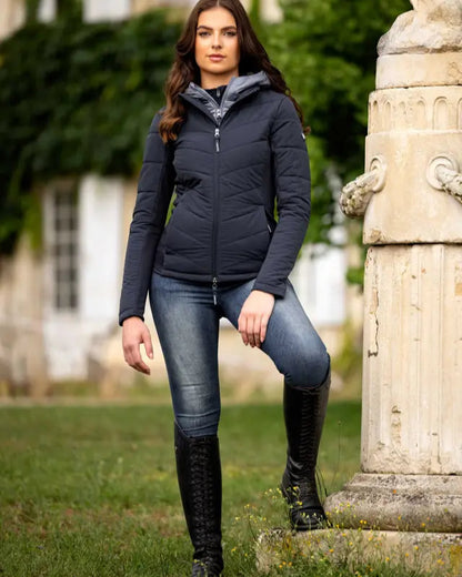 LeMieux Brioney Hybrid Jacket Navy: Woman wearing stylish weather-resistant jacket from Equiflair.