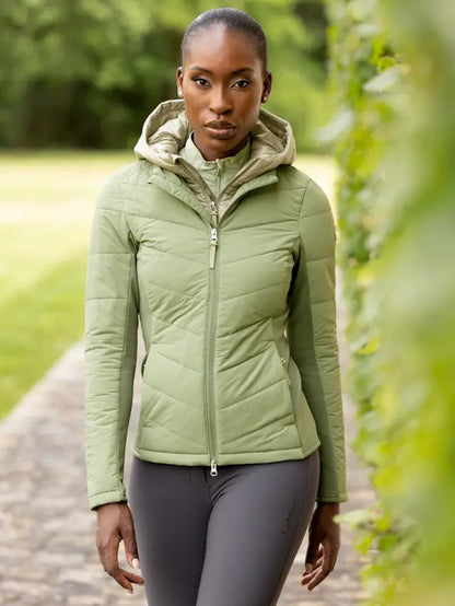 LeMieux Brioney Hybrid Jacket Thyme: Water-repellent, insulated hood, flexible warmth. Stylish & functional riding wear. Equiflair