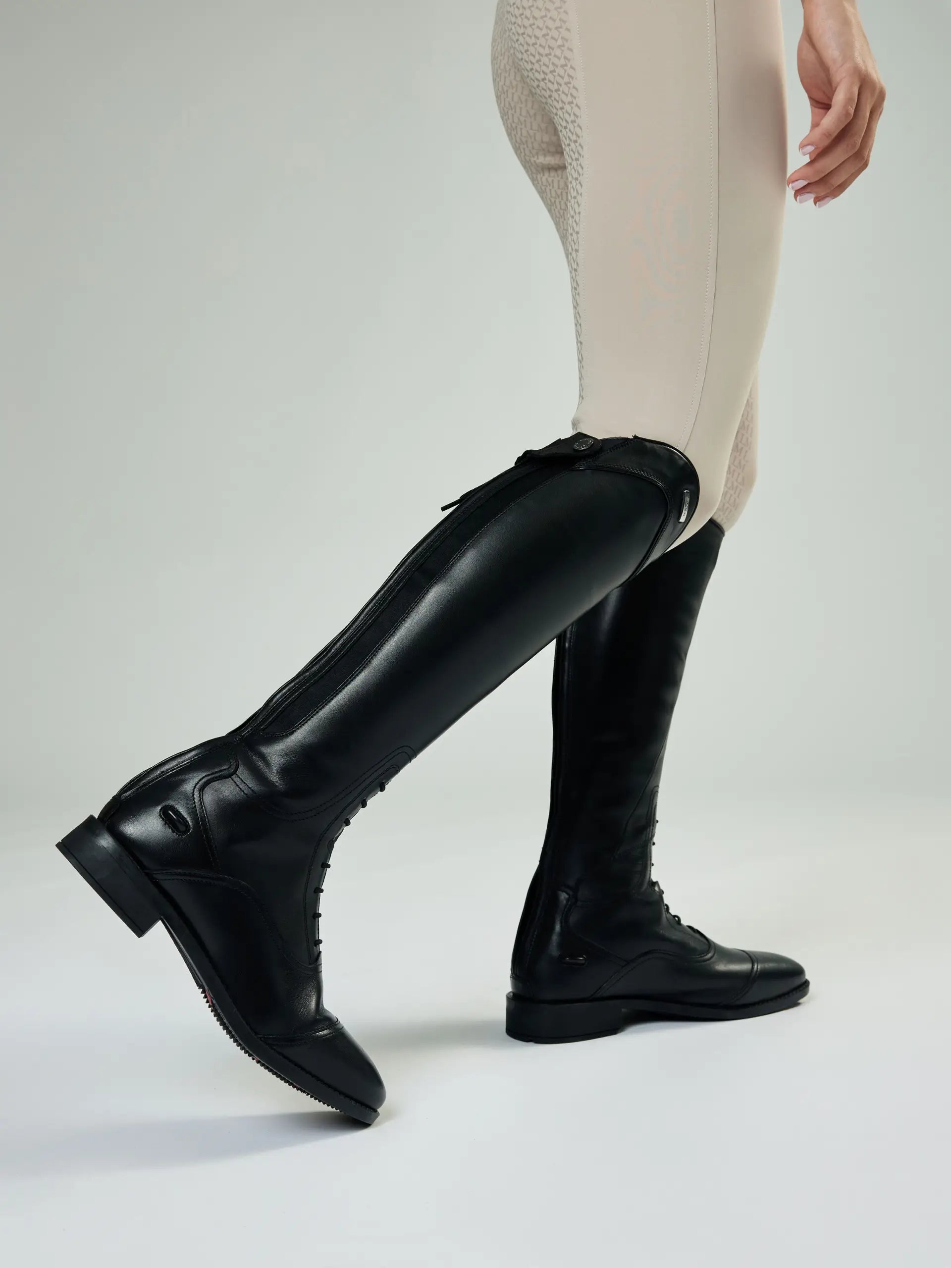 Lemieux Junior Black Riding Boots: Equestrian footwear for young riders with X-Grip sole & elastic calf gussets.