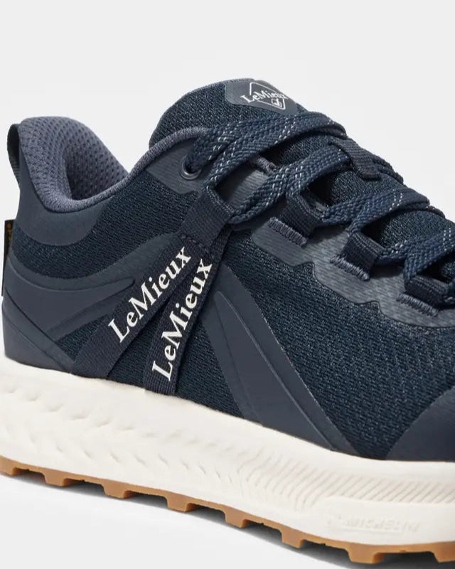 LEMIEUX TRAX Waterproof Trainer Navy: Durable all-weather equestrian shoe with Michelin sole for stability. Shop Equiflair.