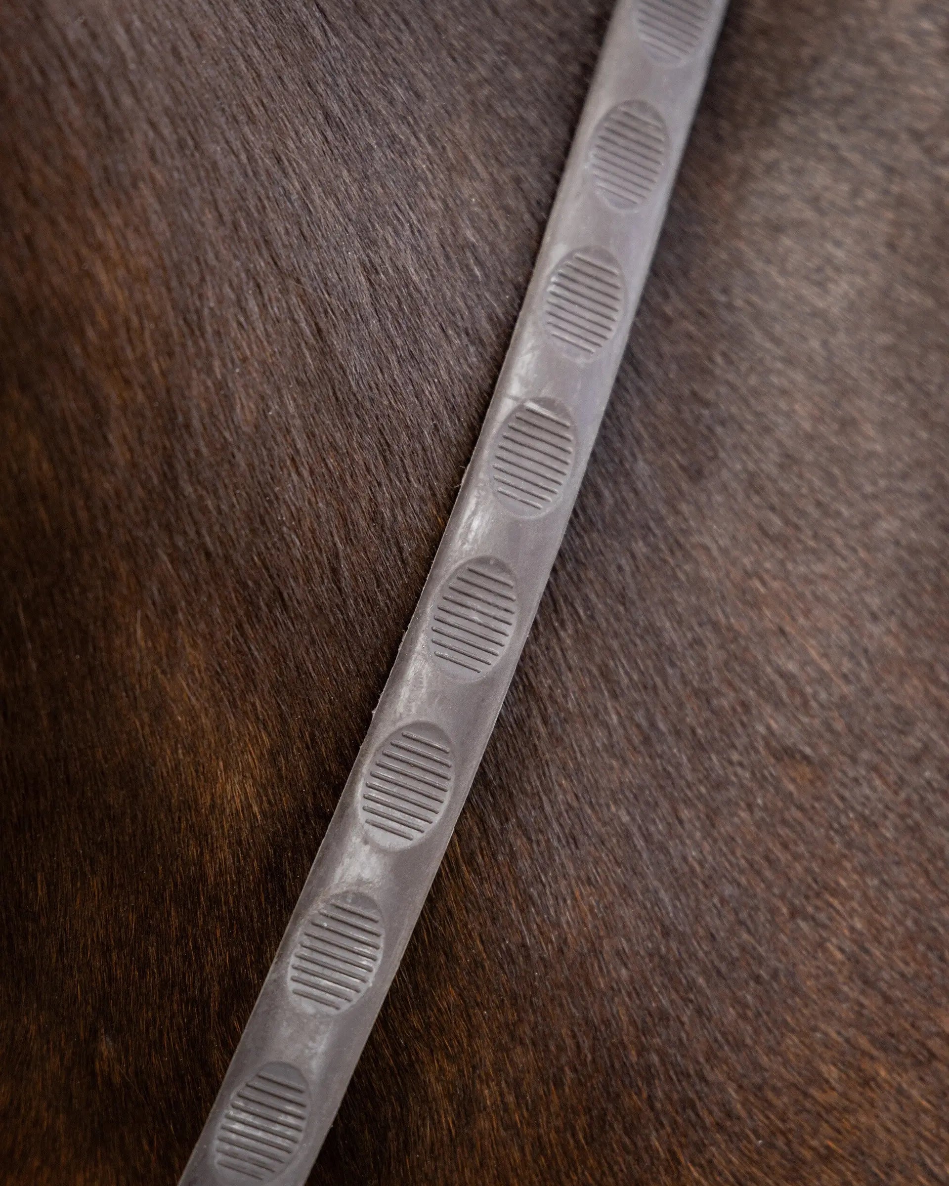 Lemieux Magna Grip Rubber Reins: Superior Grip for Horse Riding. Brown reins with silver buckle and magnetic grip