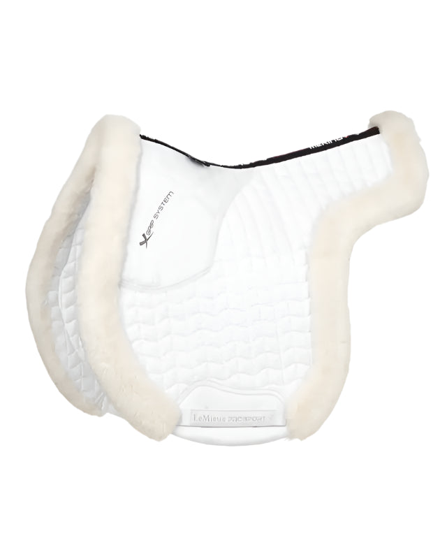 LeMieux Merino+ Hunter Saddle Pad - White. Luxurious horse riding saddle pad with Merino wool for comfort and performance.