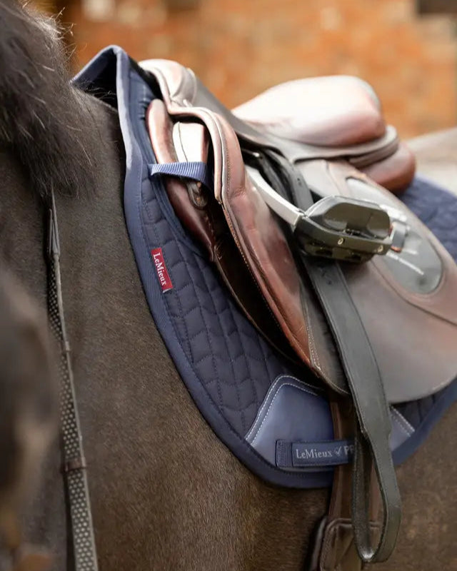 LEMIEUX PROSORB NAVY Saddle Pad on Horse - GP Square Quilted Pad with ProSorb Technology. Equiflair Equestrian Product.