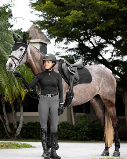 Woman with Horse Wearing LeMieux ProSorb Black Saddle Pad, Equiflair Equestrian Product
