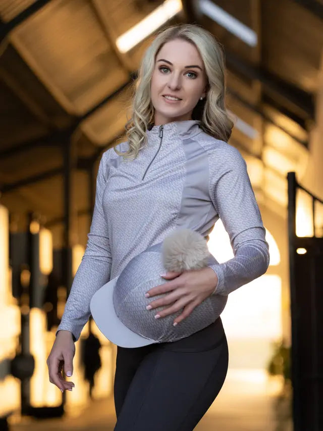 LeMieux Faith Hat Silk Ash: Equestrian Style & Safety. Removable Pom Pom. Shop Equiflair for premium riding gear!