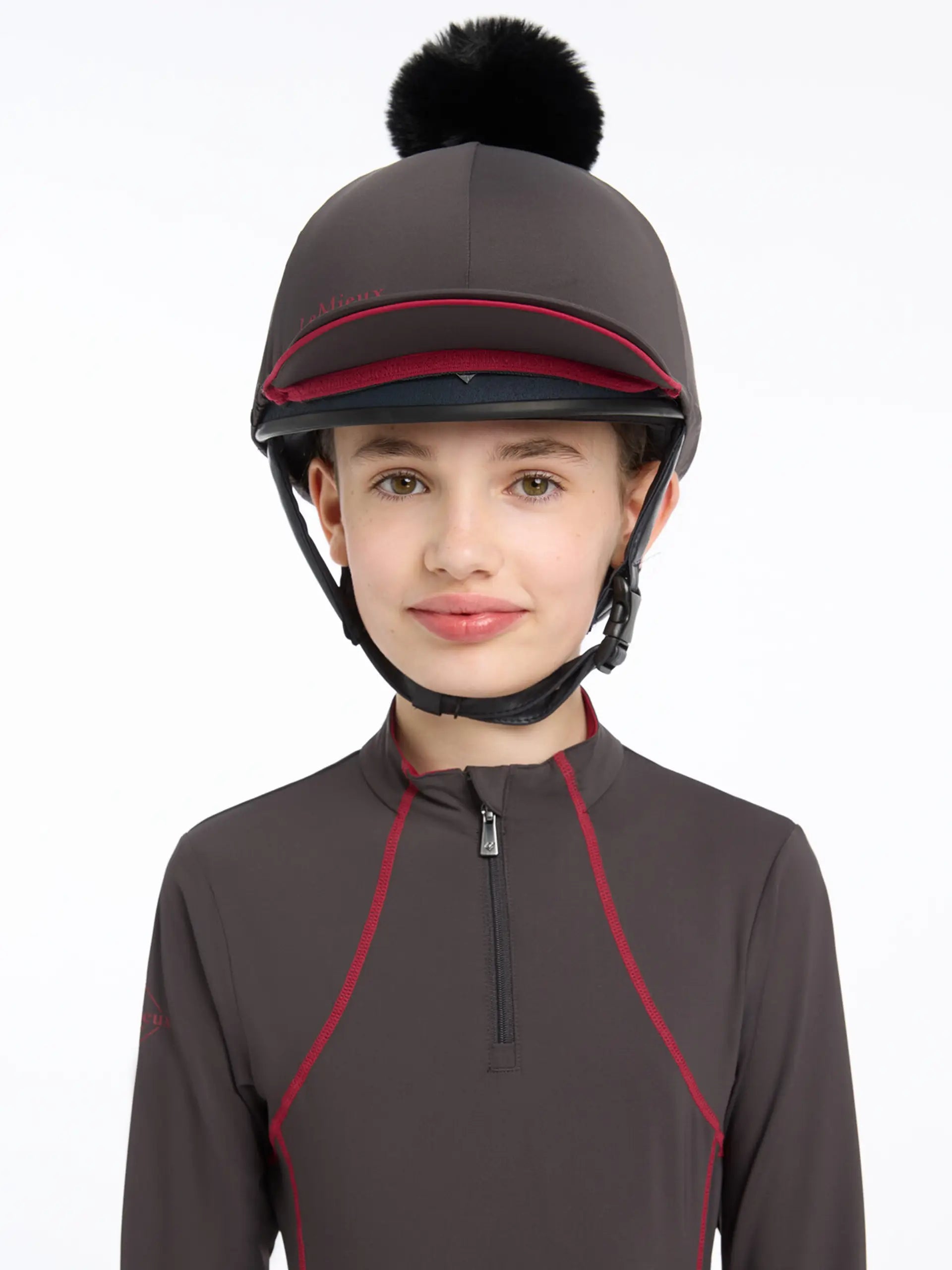 LeMieux Pippa Cinder Hat Silk: Equestrian helmet cover with faux fur pom pom and contrast peak. Riding hat accessory. #equestrianfashion