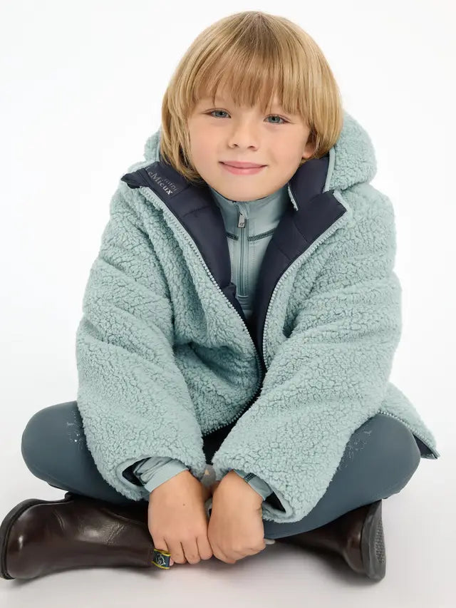 LeMieux Mini Megan Reversible Puffer Navy - Child Model Wearing a Warm Winter Coat. Equiflair Store.