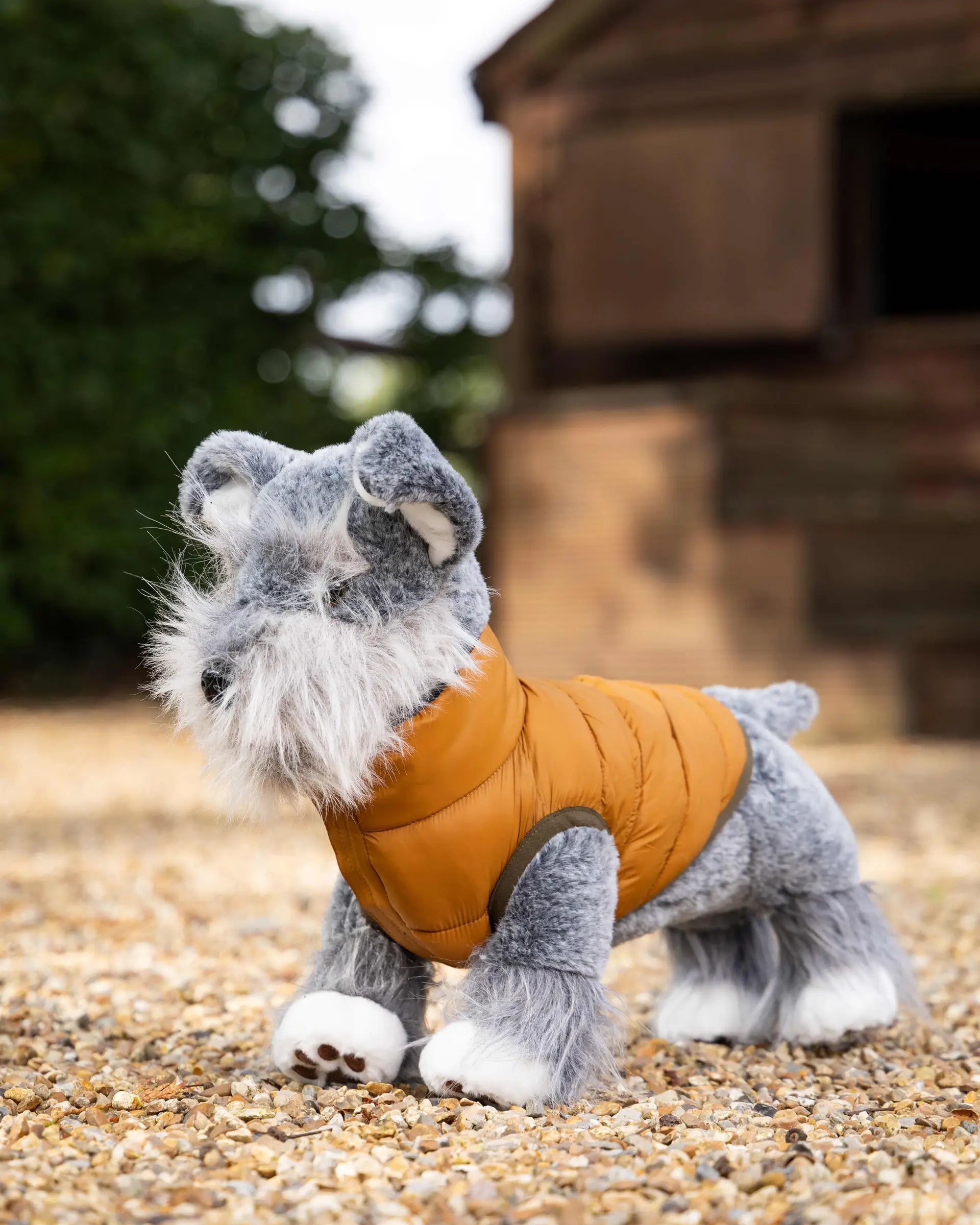 Lemieux Toy Puppy Puffer Coat Ginger: Adorable dog plush in stylish outerwear.