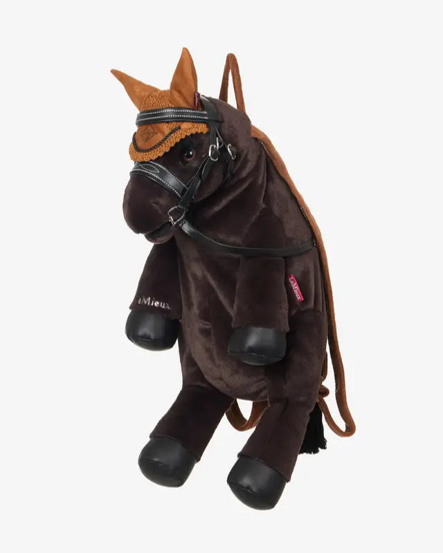 LeMieux Pony Bag Freya: Plush equestrian backpack for kids, dressable toy pony head, black straps, and spacious storage.