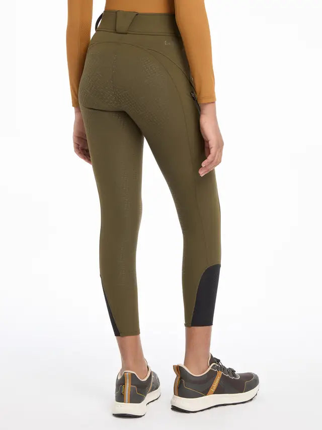LeMieux Young Rider Ella Winter Breggings Alpine: Stylish olive-green equestrian riding pants with black detailing, view from the back.