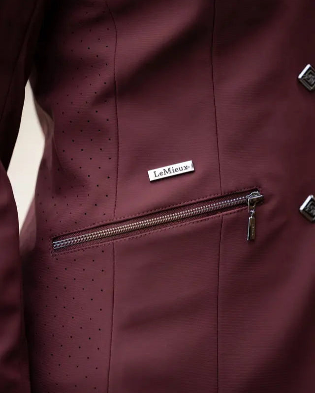 LeMieux Junior Pro Show Jacket Burgundy: Stylish equestrian show attire for young riders, available at Equiflair.