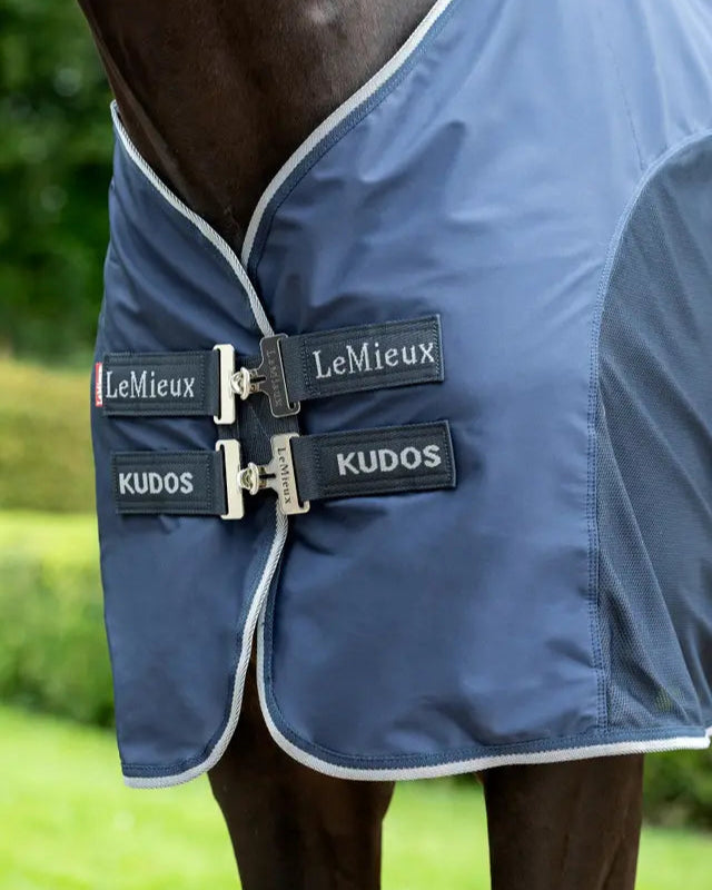 LeMieux Kudos Hybrid Cooler Rug Navy: Horse cooling blanket with 'LeMieux' and 'Kudos' straps, breathable mesh, post-exercise recovery.