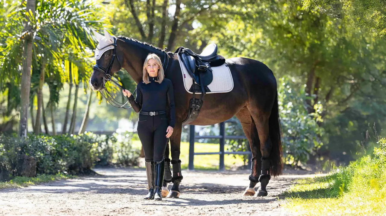 LeMieux Essence dressage saddle pad in stone with woman and horse at Equiflair Saddlery.