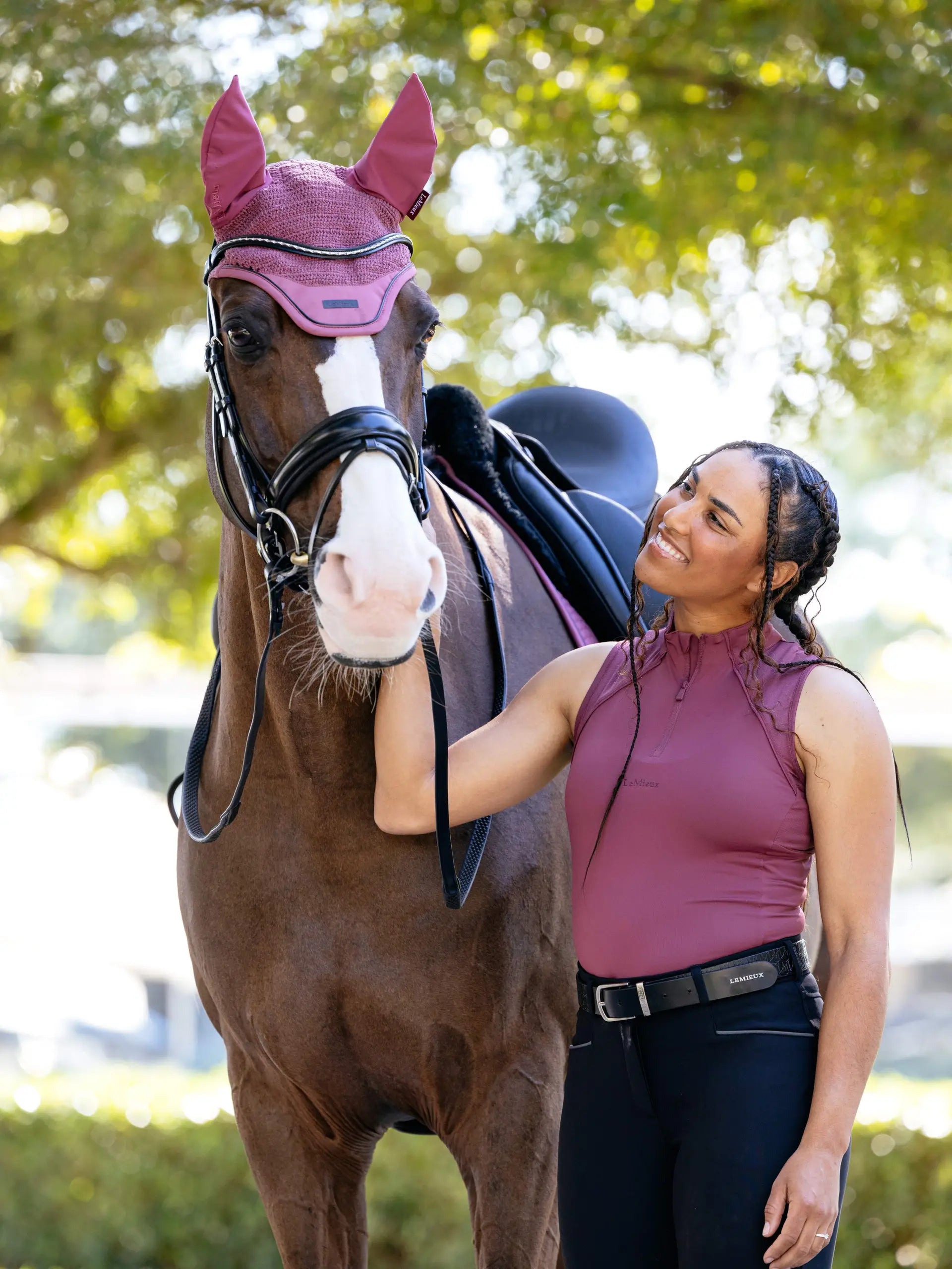 LeMieux Essence Acoustic Fly Hood Rosewood on Horse with Rider. Horse Fly Bonnet Ear Cover for Noise Reduction & Focus.