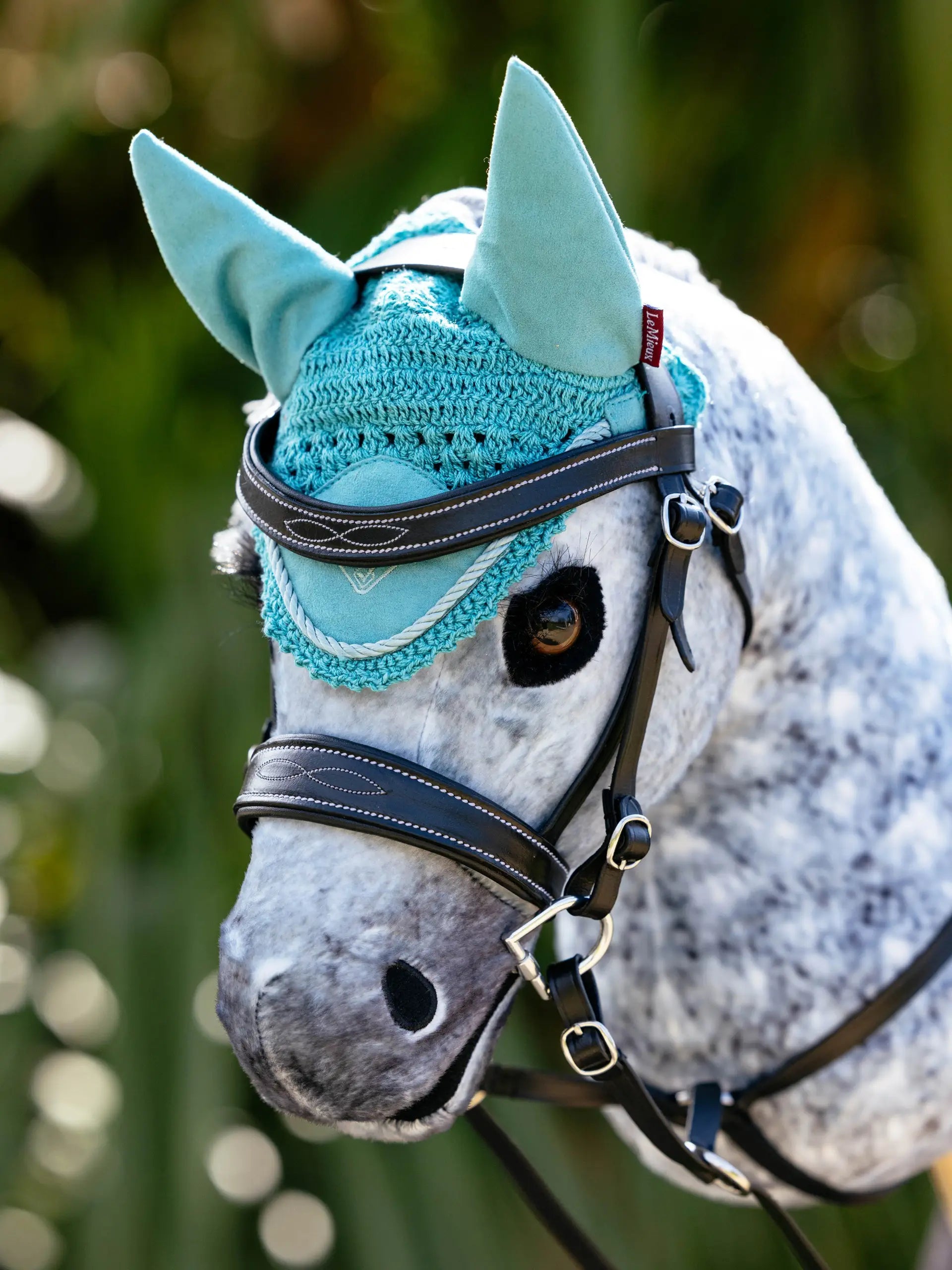 LEMIEUX Hobby Horse Fly Hood Lagoon: Miniature equestrian style with crochet, suede ears, and braided trim for toy horse.