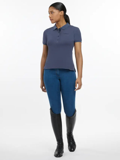 Lemieux Classique Dusk Blue Polo Shirt: Equestrian Fashion, Slim Fit, Quick-Drying. Riding Outfit with Jeans and Boots.