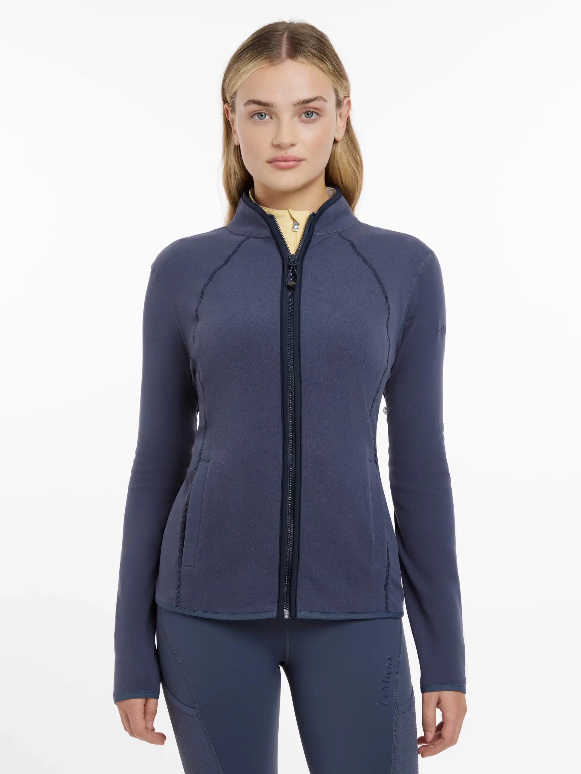 Lemieux Faye Fleece Zip Through Jacket - Dusk Blue. Equestrian Clothing. Shop at Equiflair for cozy comfort!