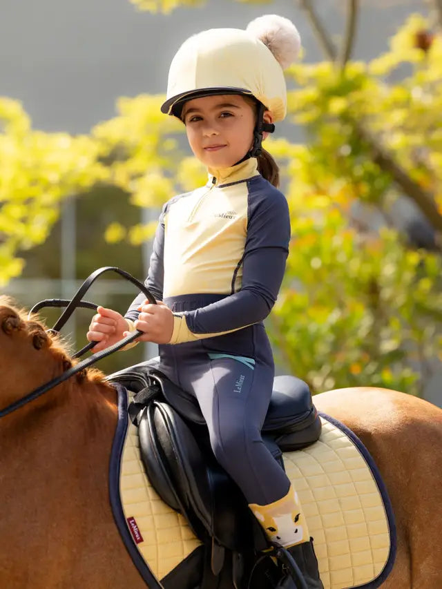 Lemieux Mini Double Pom Hat Silk Mimosa on Young Equestrian Rider - Equiflair