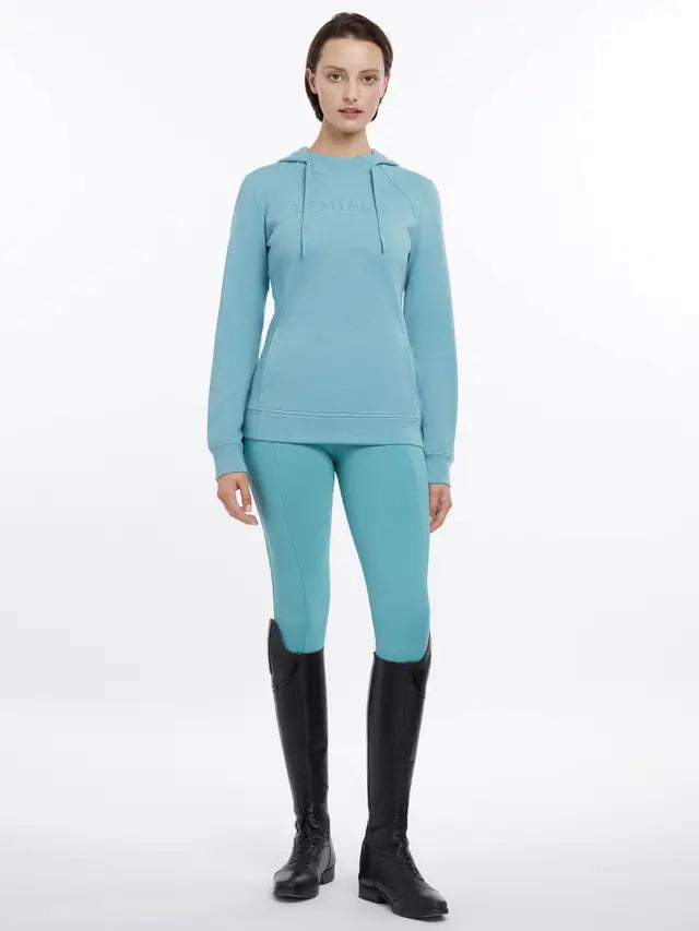 Lemieux Martha Hoodie Lagoon: Stylish Equestrian Clothing for Women. Comfortable riding hoodie.