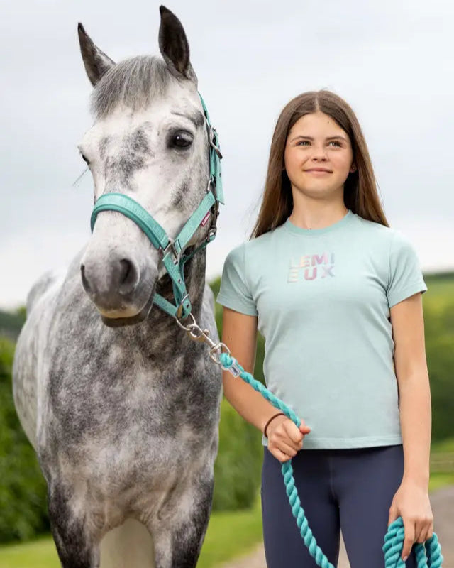 Girl with Horse Wearing LeMieux Young Rider Arianna Aqua T-shirt - Equestrian Fashion