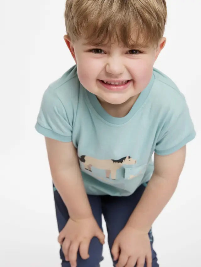 LeMieux Mini Alex Aqua T-shirt for kids with a horse design and removable brush. Adorable equestrian fashion for young riders.