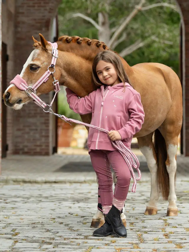 Girl with Pony in Lemieux Peony Hoodie & Riding Gear | Equiflair | Children's Equestrian Fashion