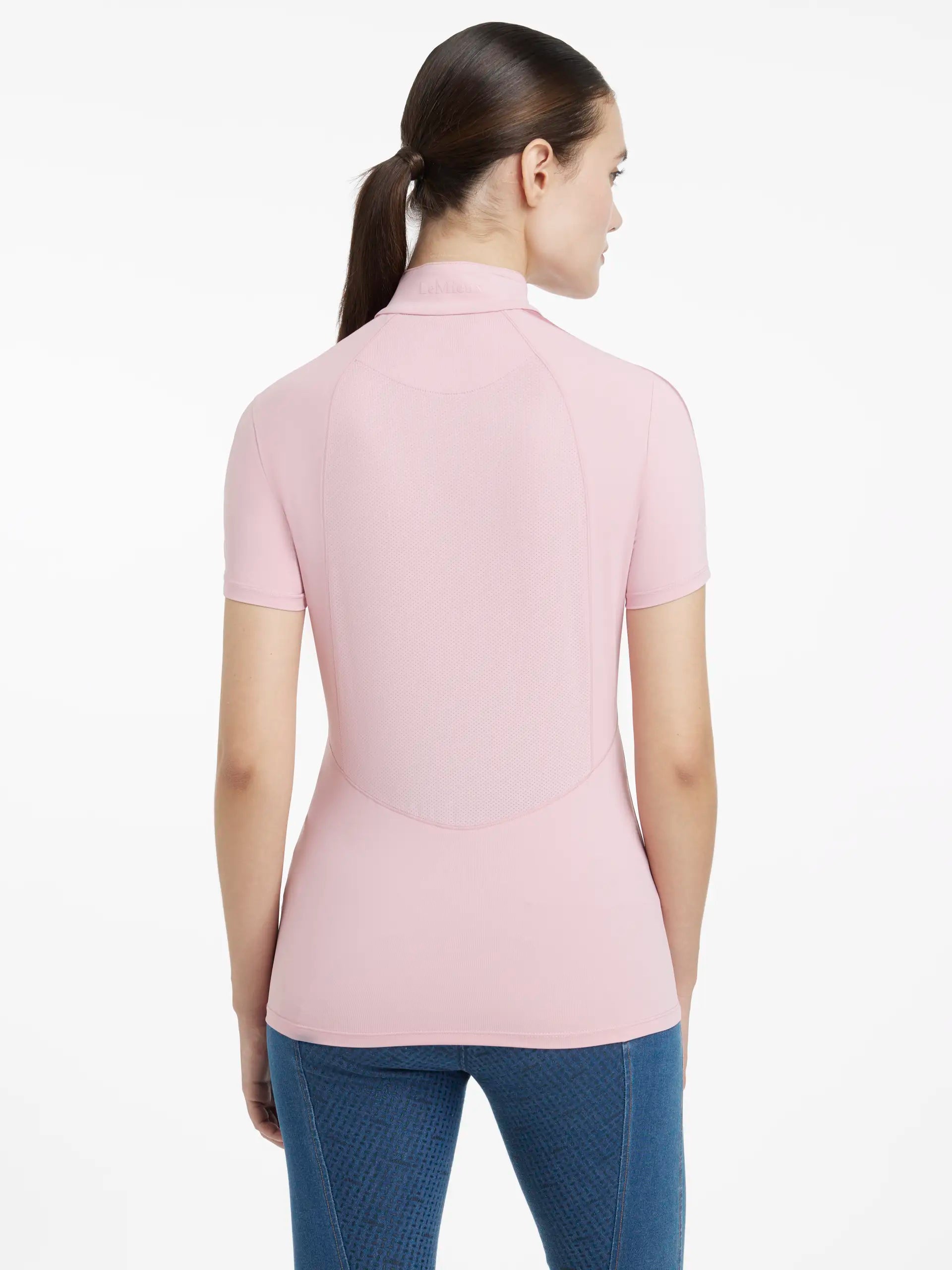 LEMIEUX MARIA MESH SHORT SLEEVE BASELAYER BLOSSOM, Woman wearing pink riding shirt
