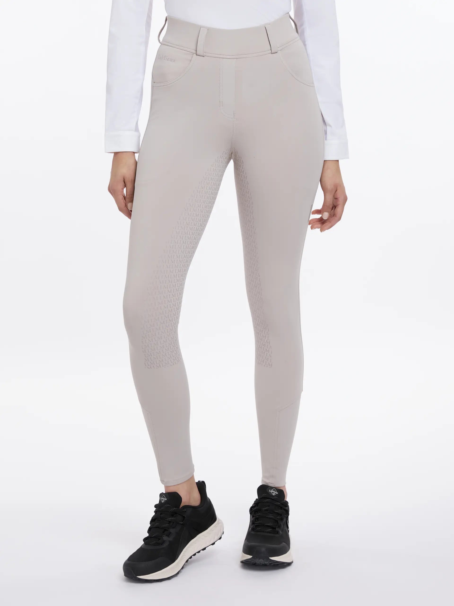 LeMieux Demi Stone Breggings: Seamless riding leggings for equestrian comfort & style. Full-seat grip, side pockets, stone color.