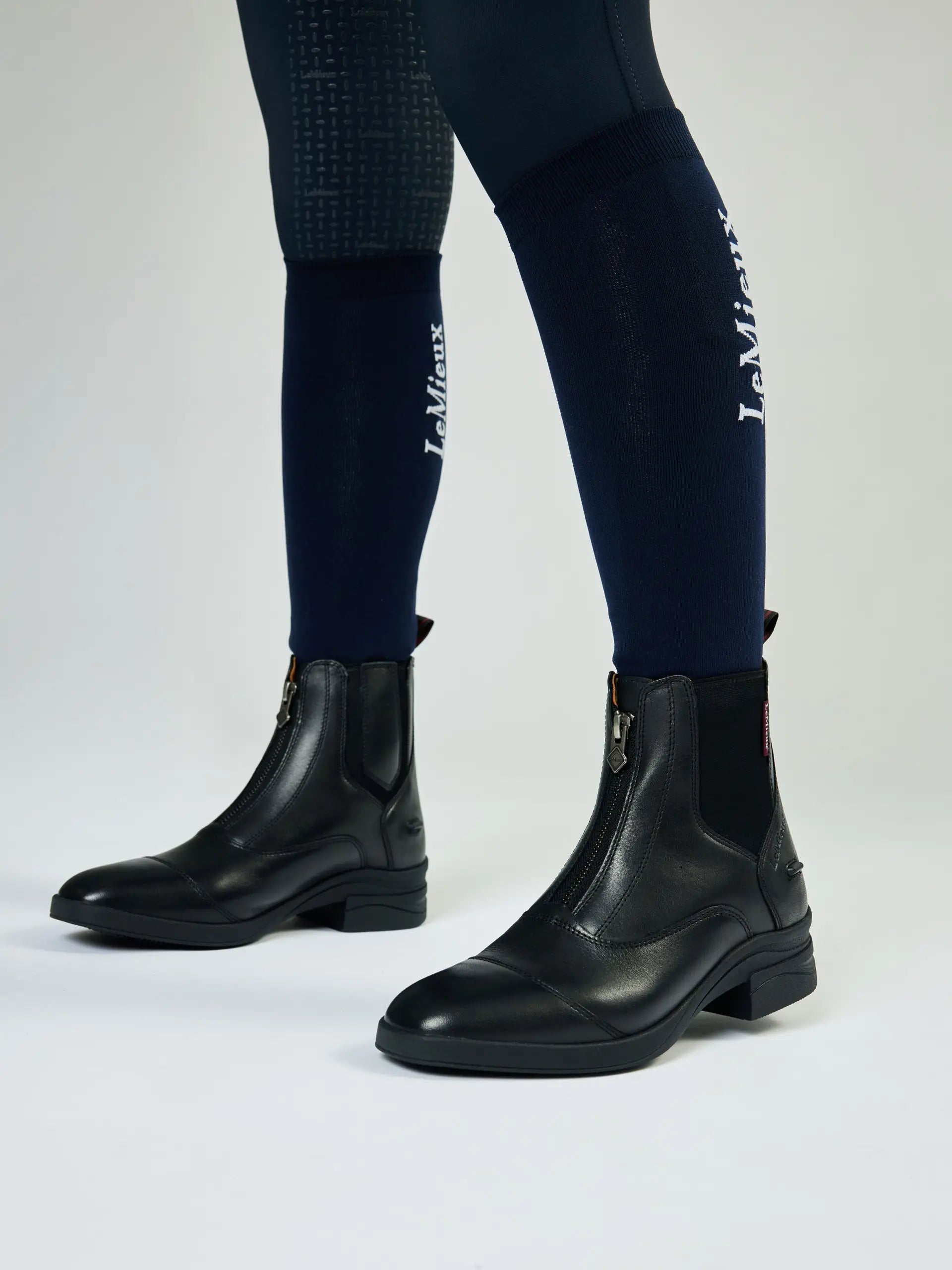 LeMieux Junior Zip Paddock Boots Black: Equestrian Riding Apparel - Stylish Leather Boots for Young Riders.
