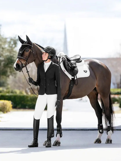 LeMieux Puissance Suede Close Contact Saddle Pad in White. Equestrian product by Equiflair. Stylish Horse Riding Equipment.