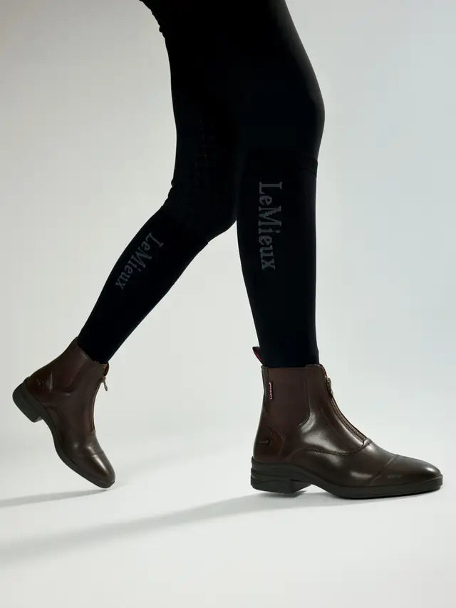 LeMieux Zip Paddock Boots Brown: Stylish leather equestrian boots with X-Grip sole for ultimate comfort & performance.