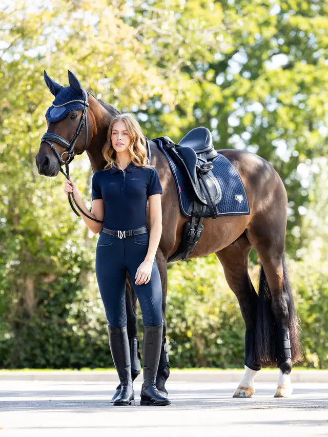 LeMieux Puissance Suede Dressage Pad Navy: Model with Horse in Equestrian Outfit & Navy Saddle Pad by Equiflair