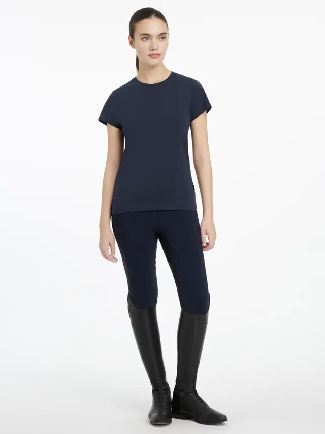 Woman in Navy T-Shirt, Equestrian Riding Leggings & Boots | Equestrian Style