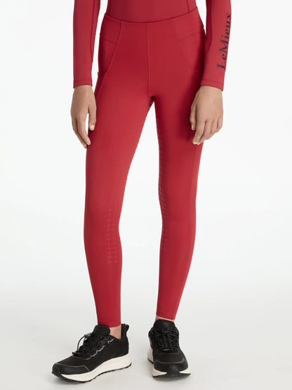 LEMIEUX Young Rider Orla Pull Ons in Chili: Equestrian riding leggings with full seat grip & leg pockets for horse riding comfort.
