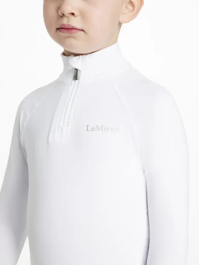 LeMieux Mini Classique White Base Layer: Equestrian riding shirt for kids with UV protection and moisture-wicking fabric. 