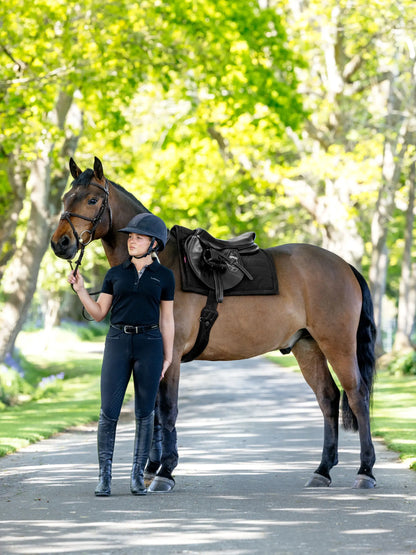 Equestrian: Woman with Horse, LeMieux Pillow Pad Black Saddle, Riding Gear. Equiflair.