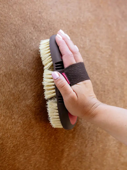Lemieux Flexi Scrubbing Brush in Cranberry being used on horse. Horse grooming equipment.