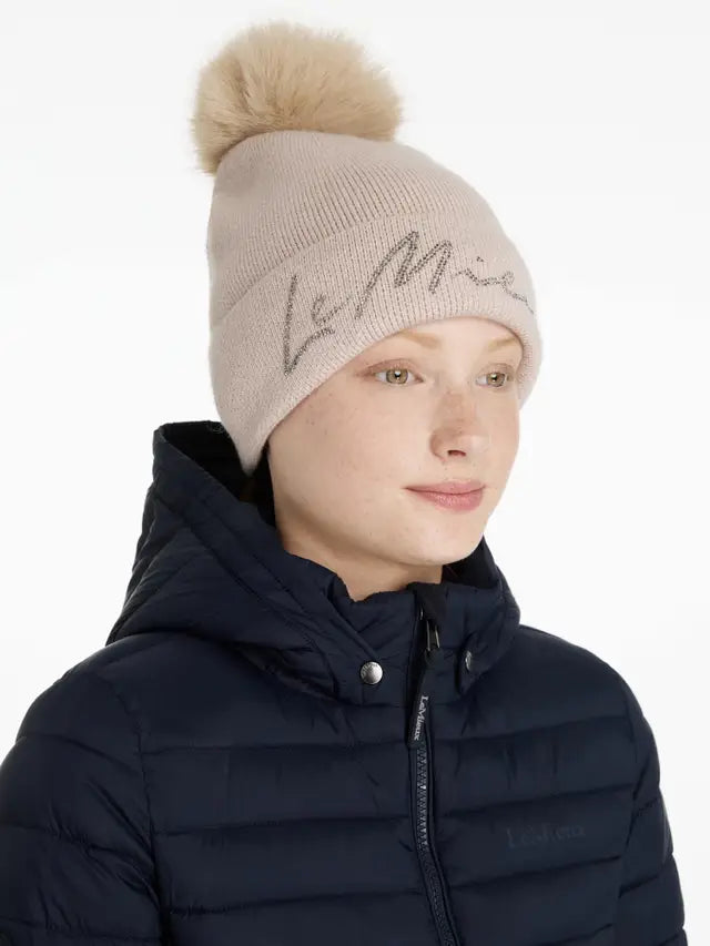 LeMieux Sparkle Beanie in Stone. Winter Hat with Pom Pom. Shop now for Stylish Warmth! #LeMieux #WinterFashion