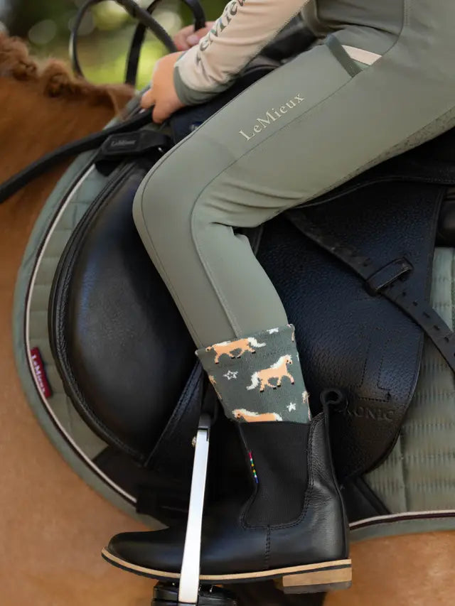 Child rider in Lemieux Mini Pull-Ons Rosemary, horse riding leggings, equestrian style.