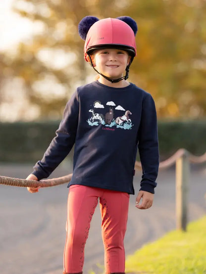 LeMieux Mini Poppy Long Sleeve Top Navy for Kids | Horse Riding Apparel | Girl in Equestrian Outfit & Helmet