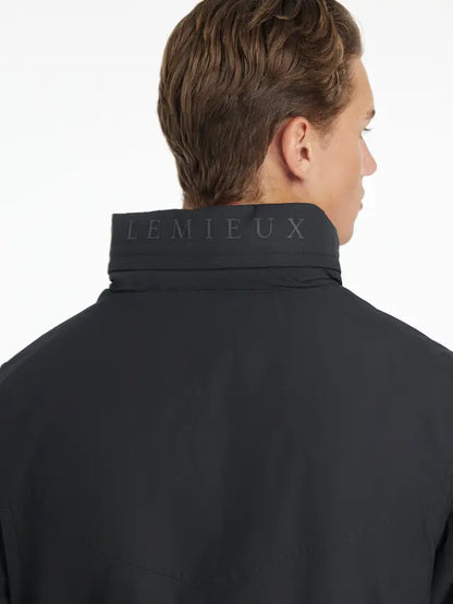 LEMIEUX Mens Waterproof Team Jacket Black. Stylish, high-performance equestrian outerwear for men, showcasing the brand name on the collar.
