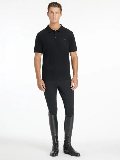 LeMieux Mens Black Classique Polo Shirt. Equestrian riding apparel. Man in Polo, riding pants and boots.