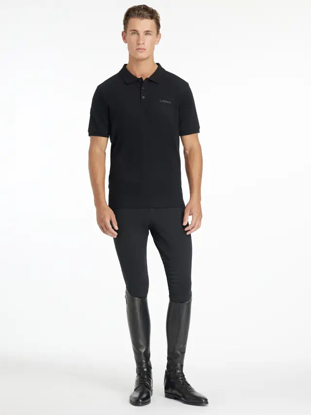 LeMieux Mens Black Classique Polo Shirt. Equestrian riding apparel. Man in Polo, riding pants and boots.