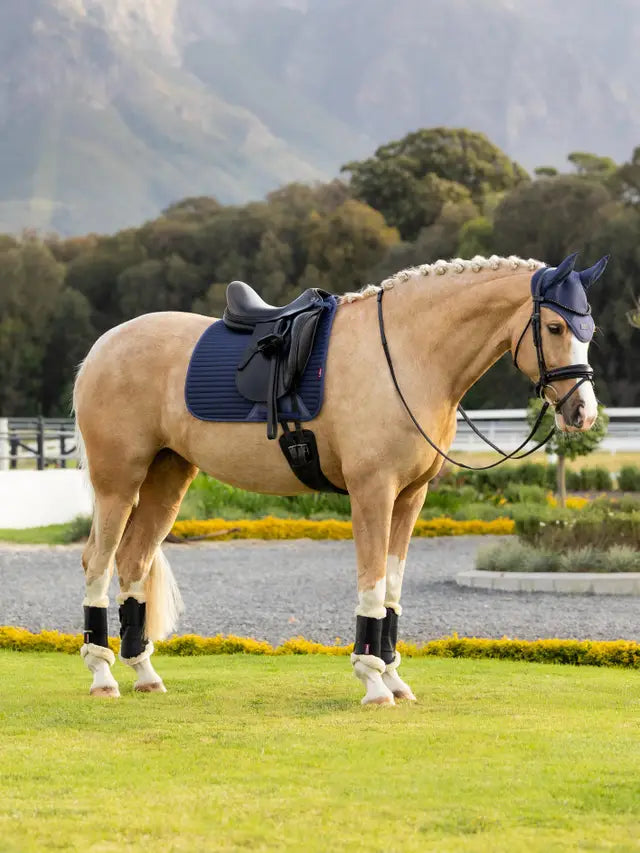 Horse wearing LeMieux Air-Tek Dressage Saddle Pad Shadow cooling design