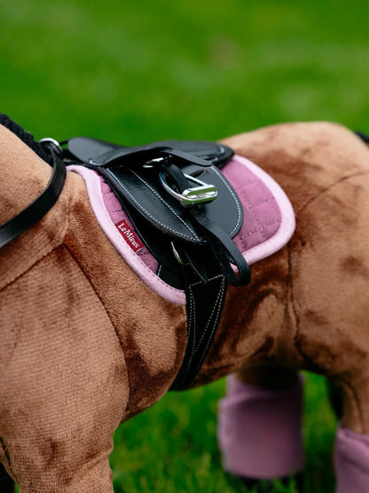 LeMieux toy pony pad mallow on plush brown pony with pink saddle pad